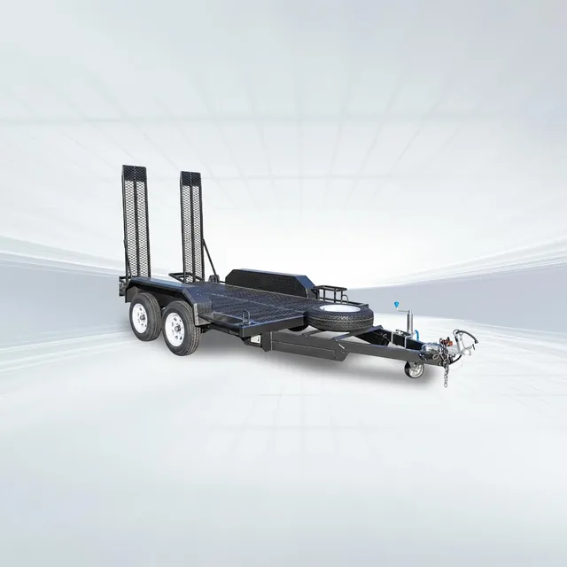 Studio side angled view of black 10x5 machinery trailer with grip mesh floor, mesh ramp and uprights on white background.