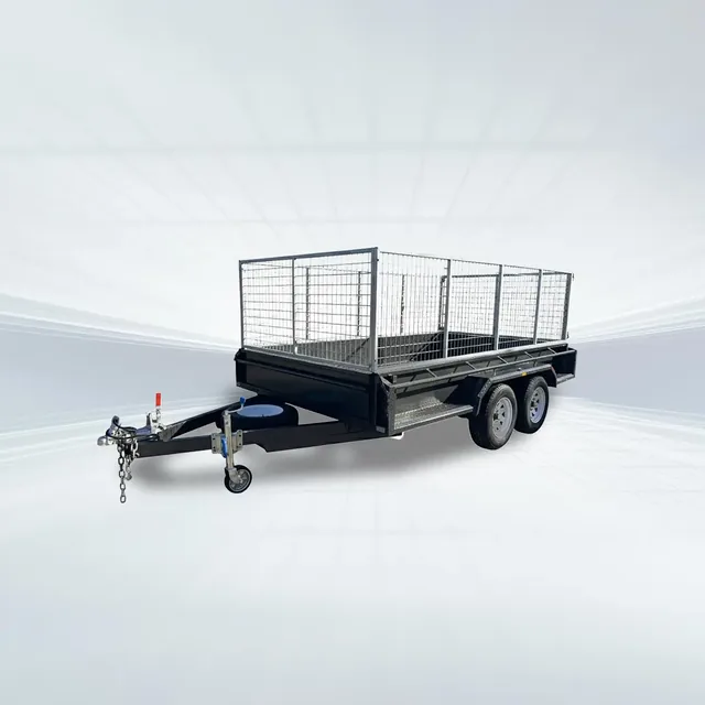 10x6 tandem trailer with 1990kg GVM, full checker plate floor, 380mm sides, full tie-down rails, and 900mm high galvanised cage in studio setting.