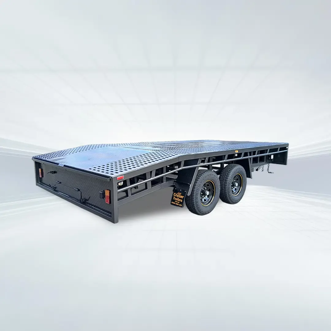 Studio shot of black 4.8m x 2.4m beavertail flat top trailer with 3500kg GVM and perforated sheet floor.