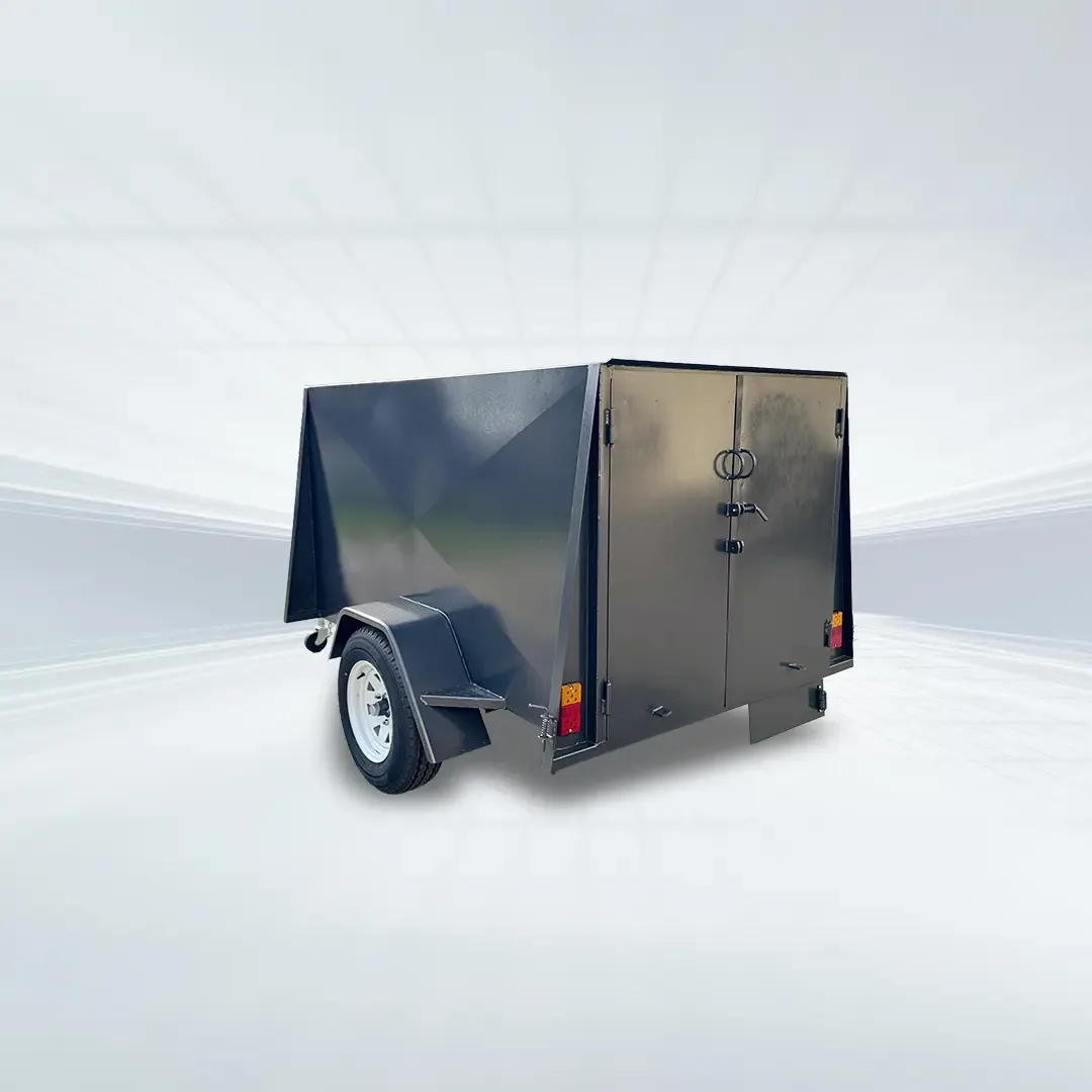 Studio three-quarter view of black 7x4 enclosed trailer with 750kg GVM, 4ft internal height, and rear barn doors on white background.