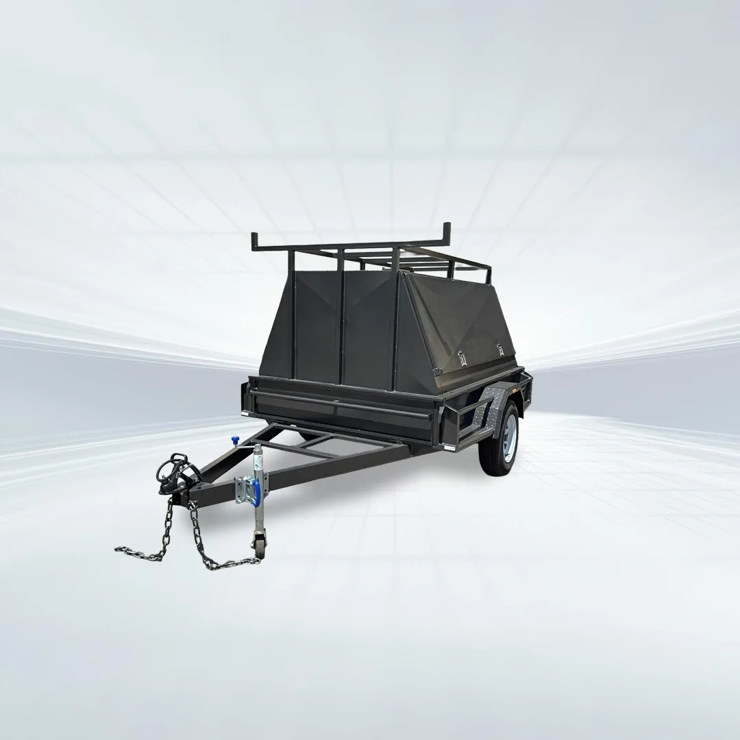 Studio side angled view of black 8x5 tradesman trailer with two-piece canopy and roof rack on white background.